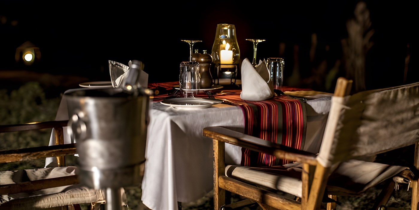 A romantic bush dinner whilst on Safari