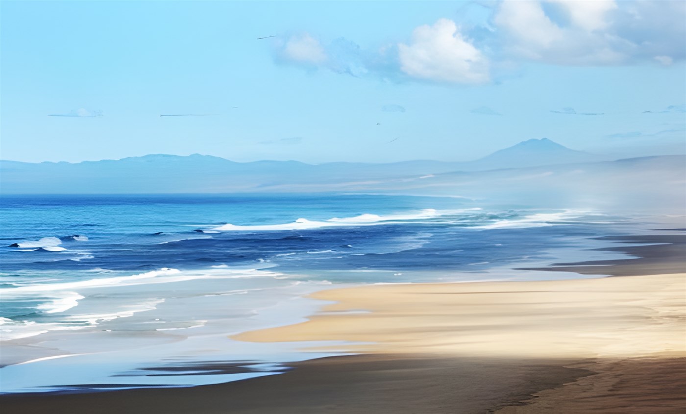 The stunning blue waters and beautiful sandy beach of St Francis Beach in the Eastern Cape, South Africa, meeting the clear sky.