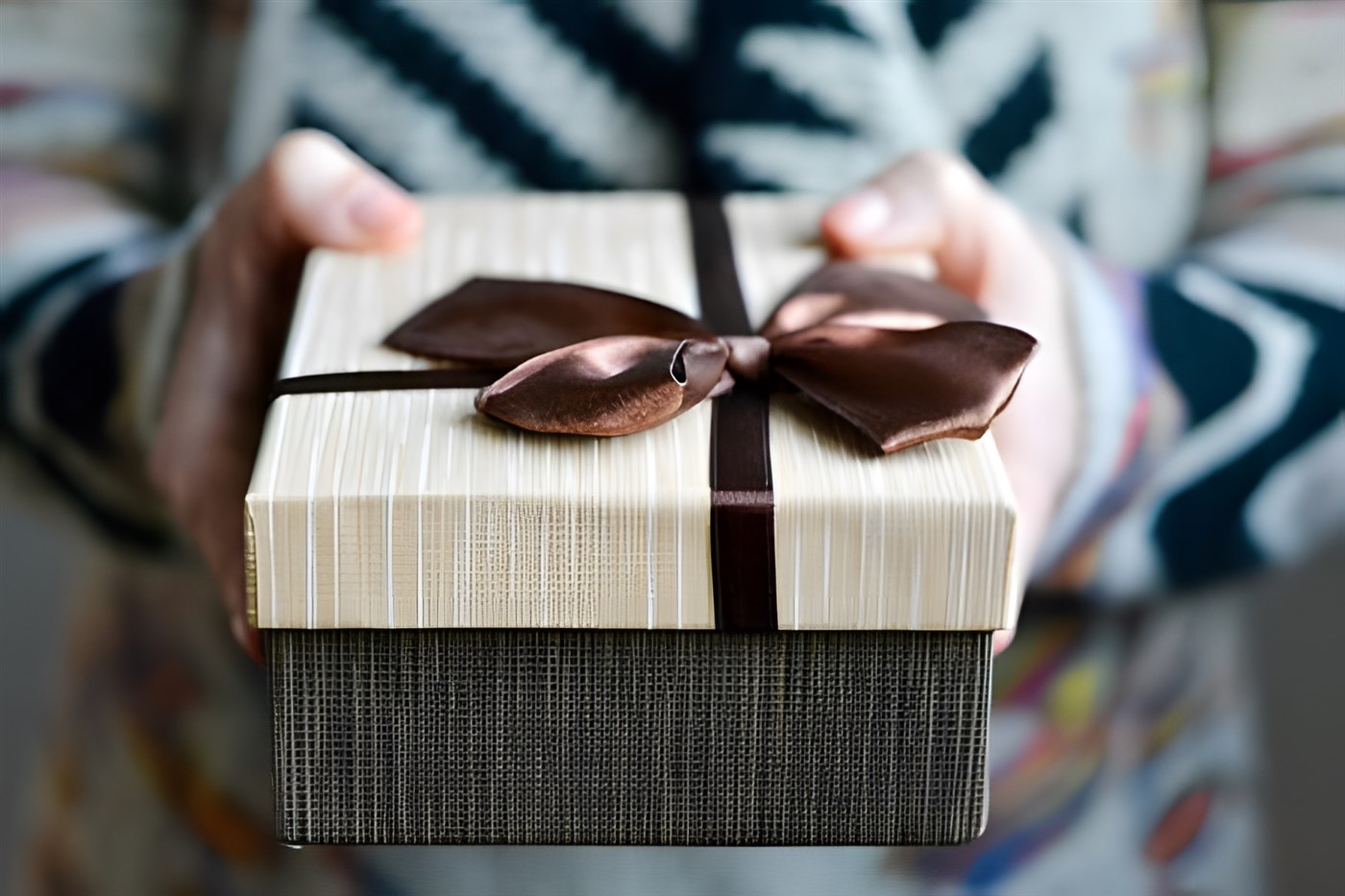 gift box being presented to someone