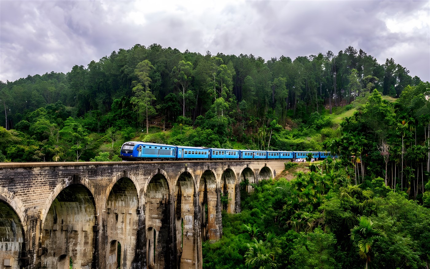 The iconic blue train going over Sri Lanka's Nine Arch Bridge near Demodora between Ella and the end of the line at Badulla.