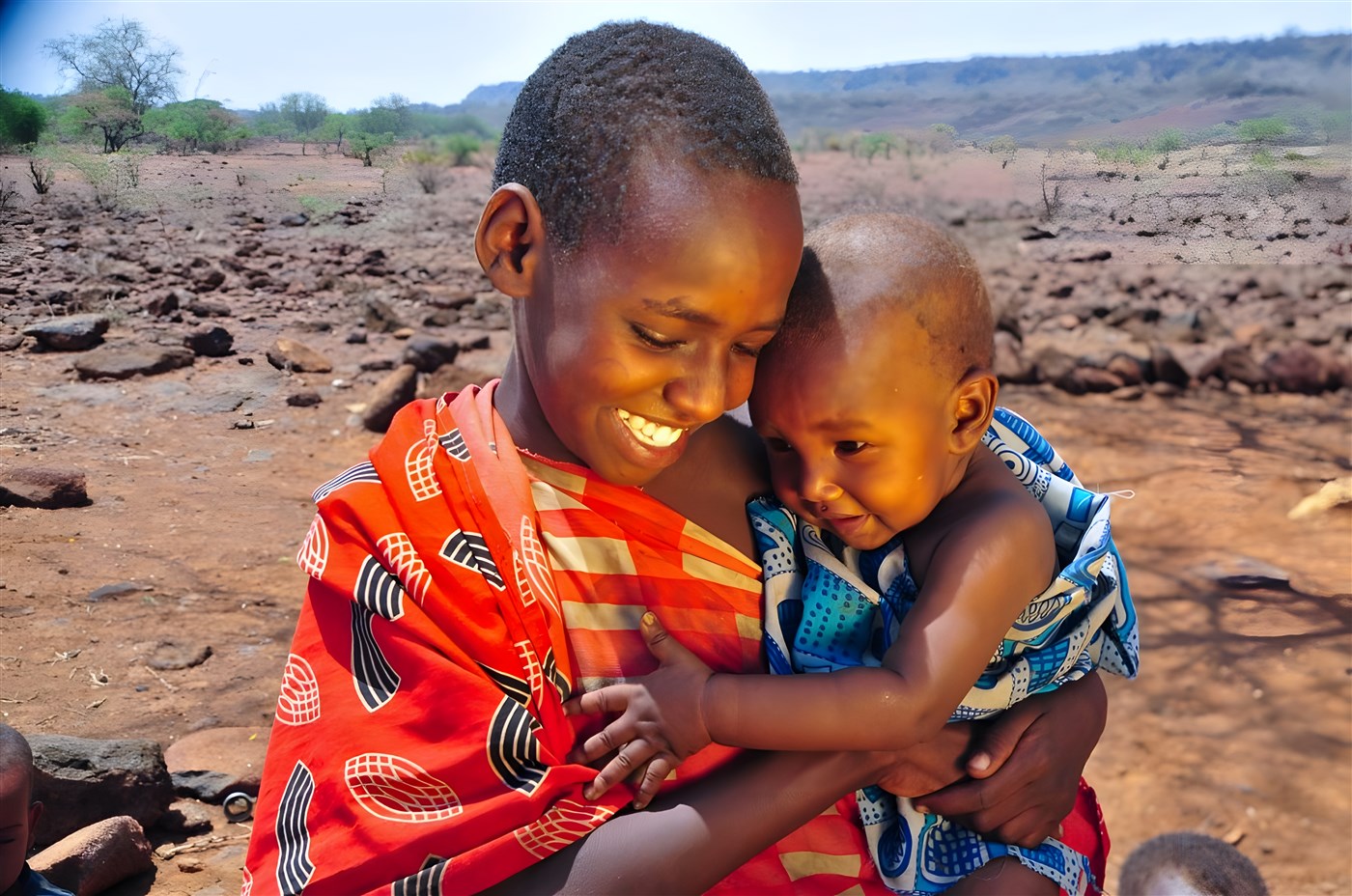 Young girl with baby