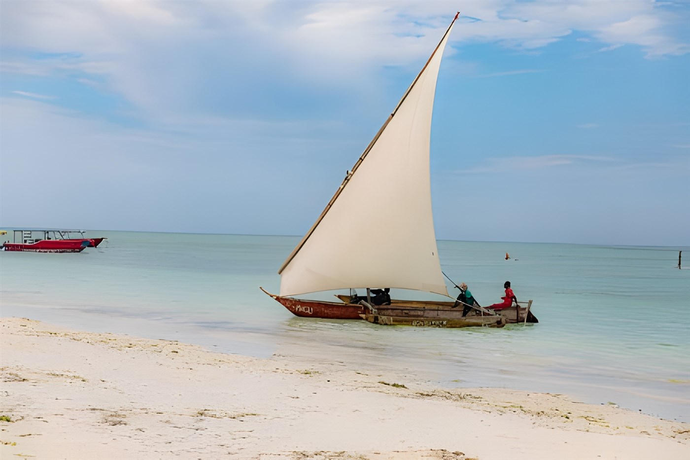 A traditional sailboat on a beach on Zanzibar Island