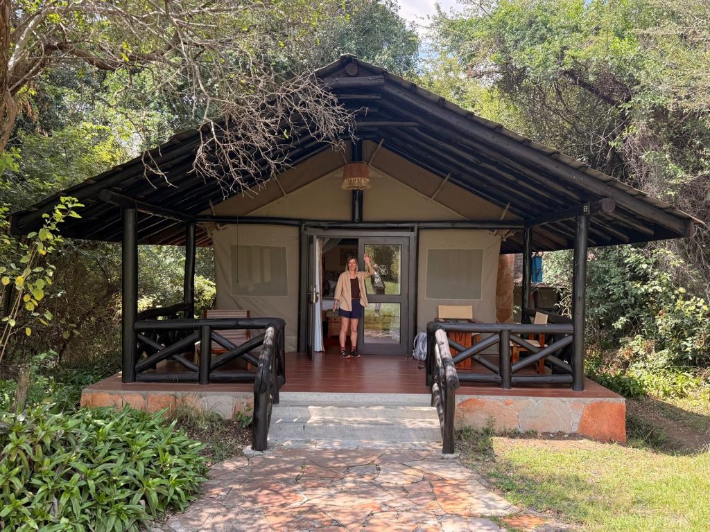 Liz standing in front of the family tent at Samburu Intrepids camp in kenya