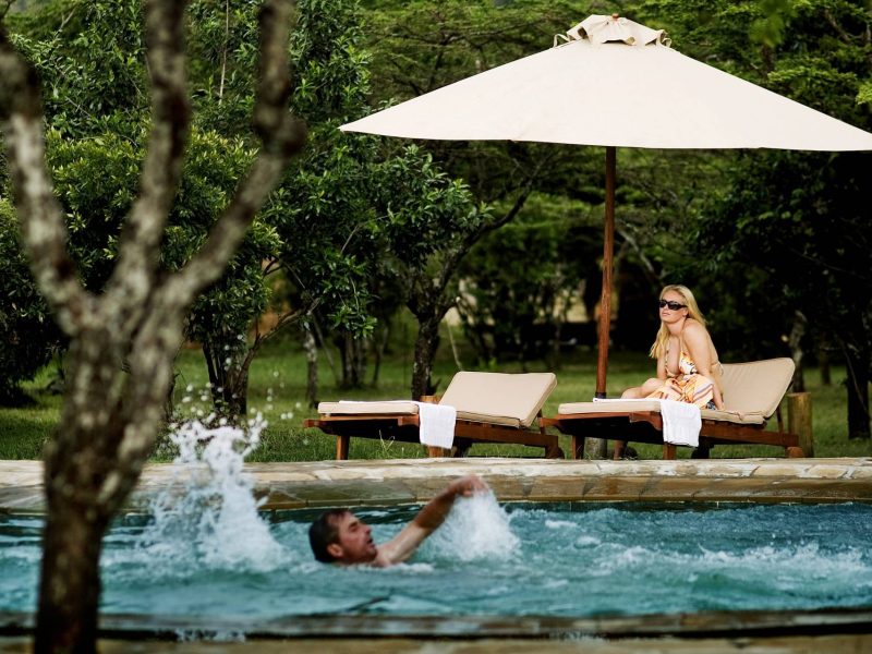 Enjoy downtime between safari drives in the pool at Karen Blixen Camp